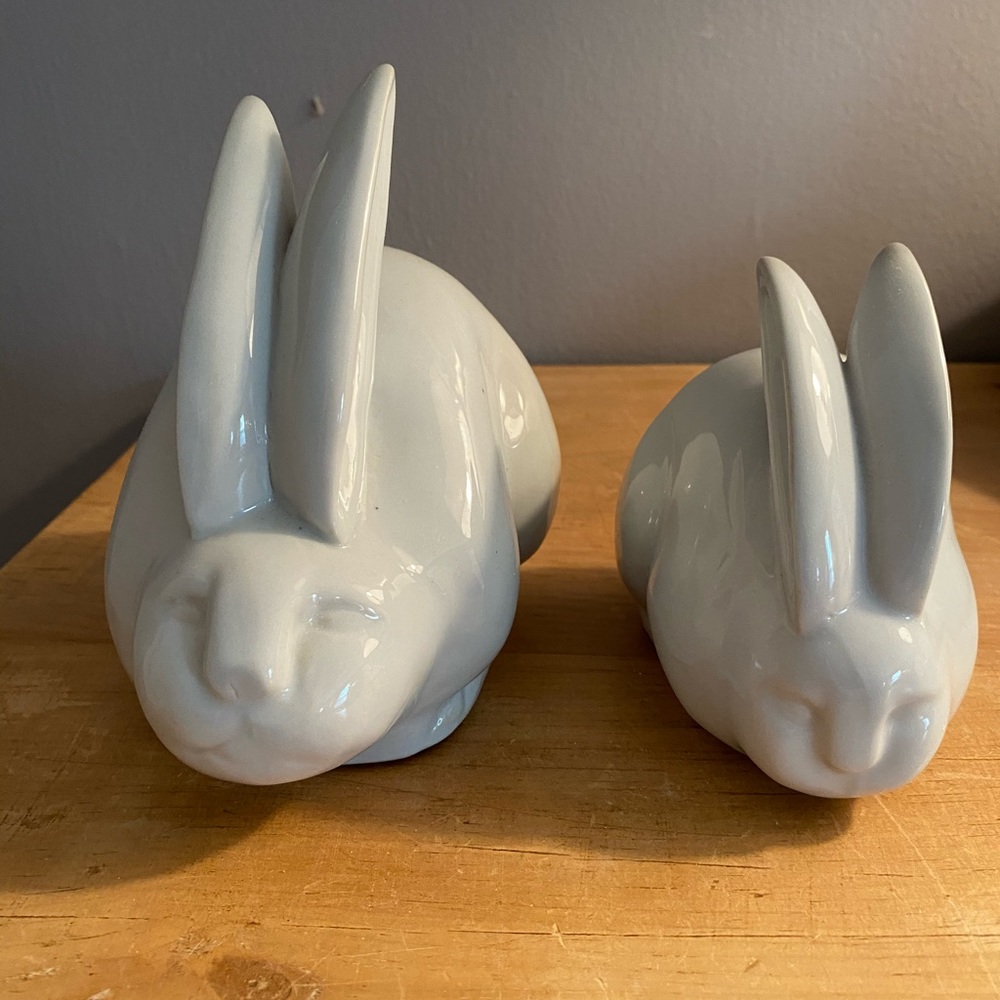 Pair of white pottery bunnies